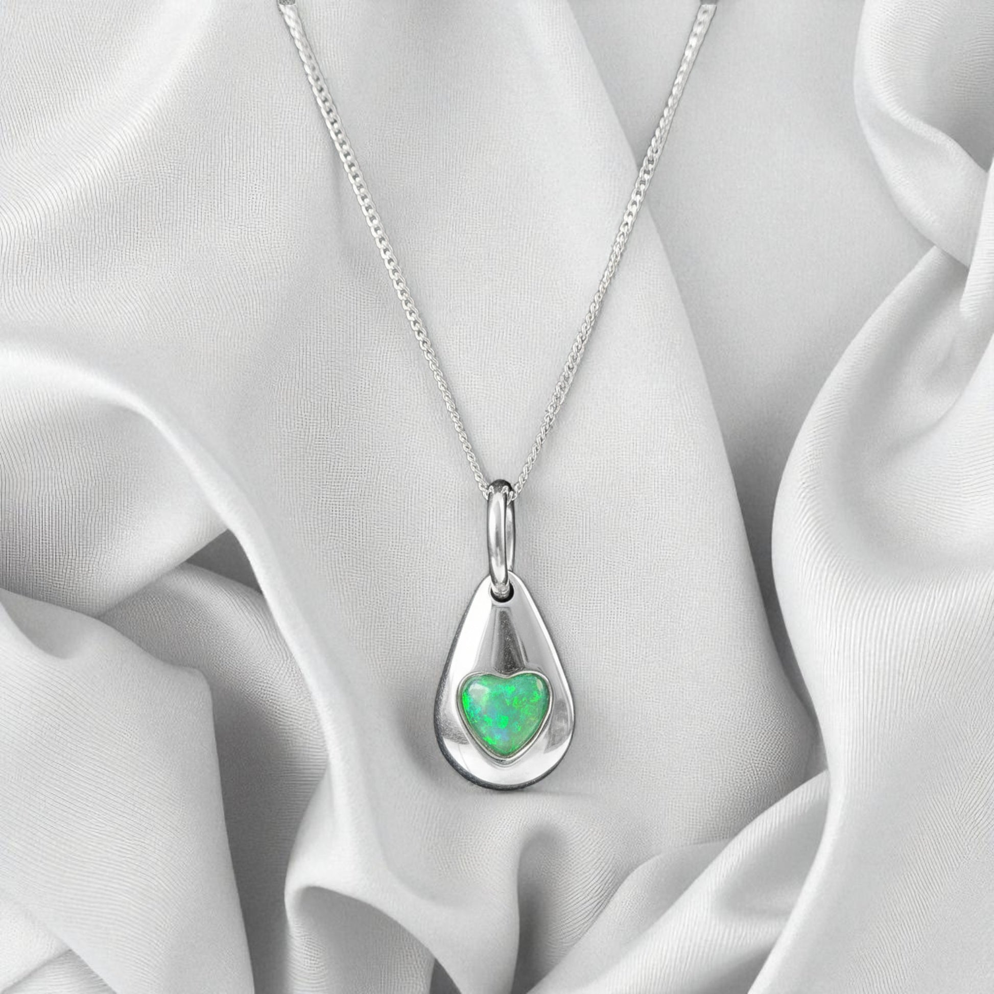 Silver pebble memorial pendant, handcrafted in Lancashire, UK