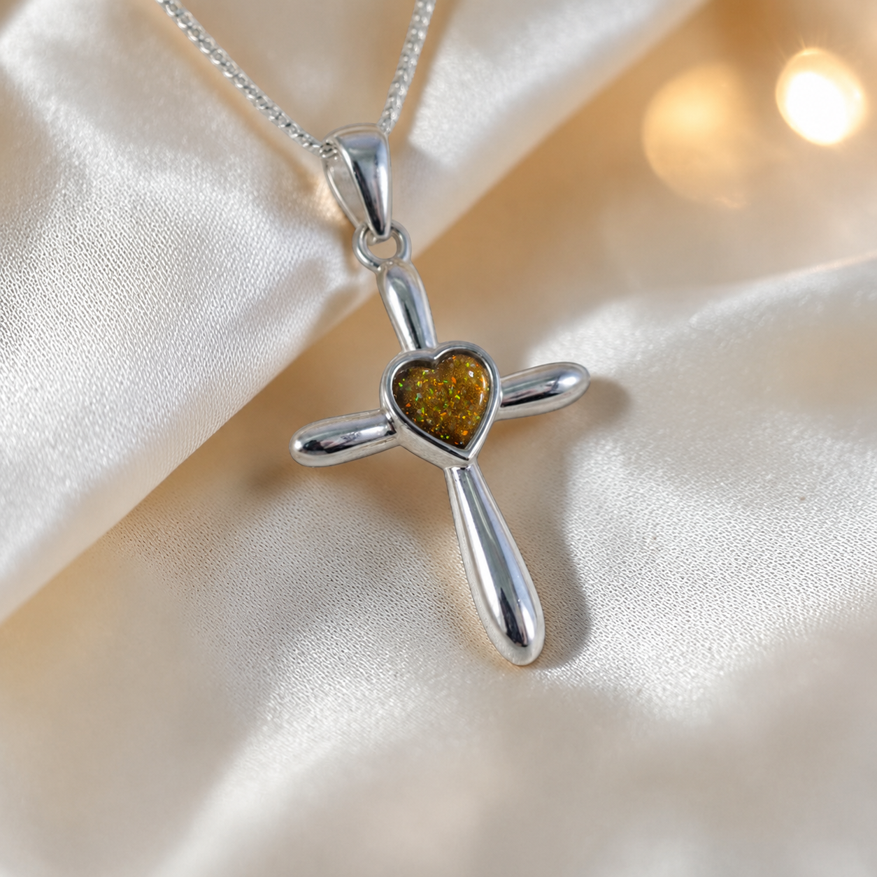 Saiph dainty sterling silver ashes cross with heart detail in gold olive, handcrafted in Lancashire UK - by Keepsake Memorial Jewellery  