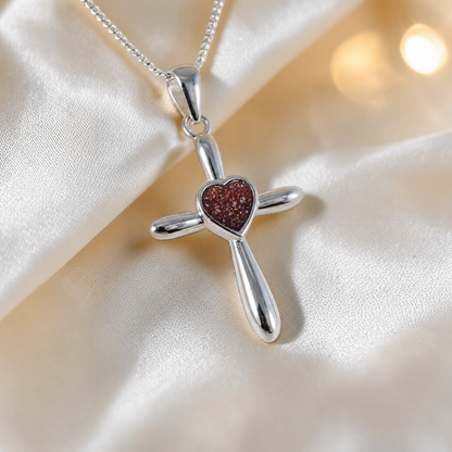 Saiph dainty sterling silver ashes cross with heart detail in ruby red, handcrafted in Lancashire UK - by Keepsake Memorial Jewellery  