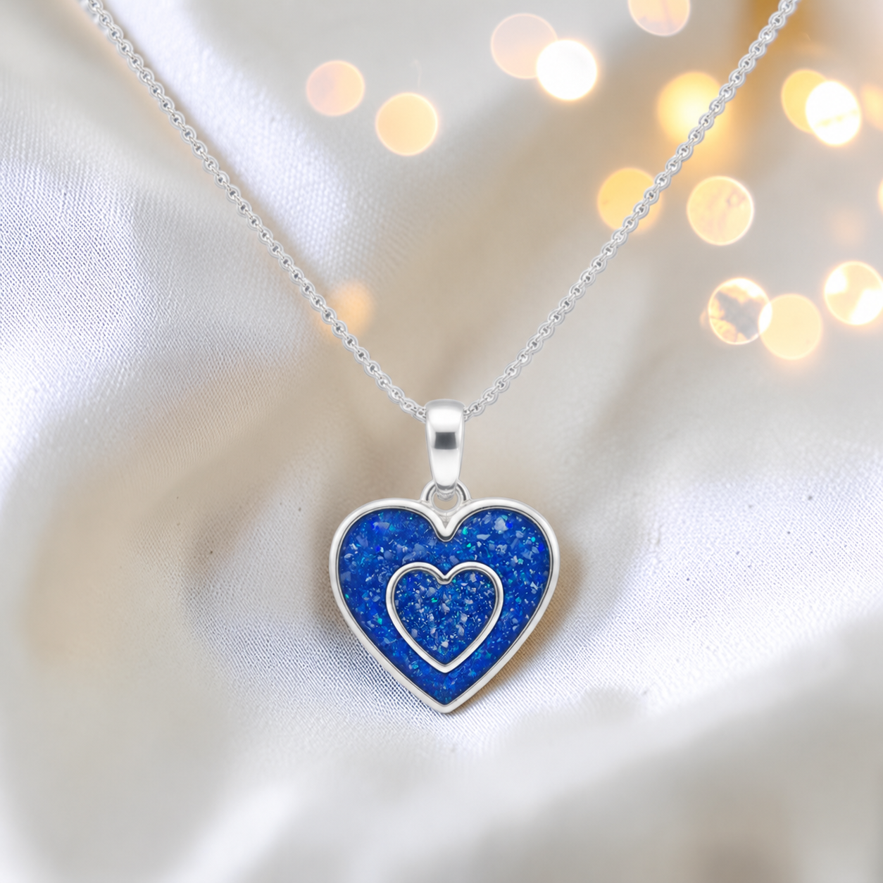 Shaula two heart memorial pendant in royal blue, handcrafted in Lancashire UK - by Keepsake Memorial Jewellery