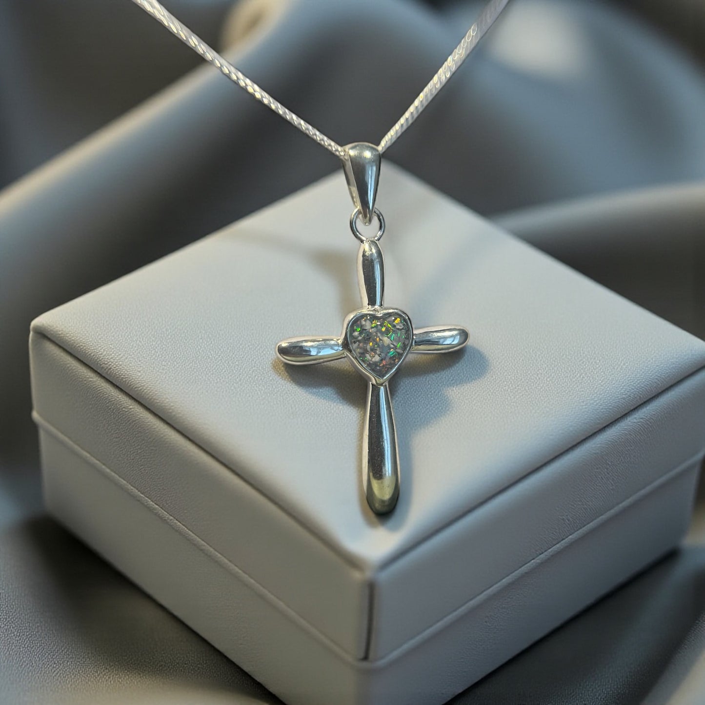 Silver cross keepsake pendant for ashes, handcrafted in Lancashire, UK 