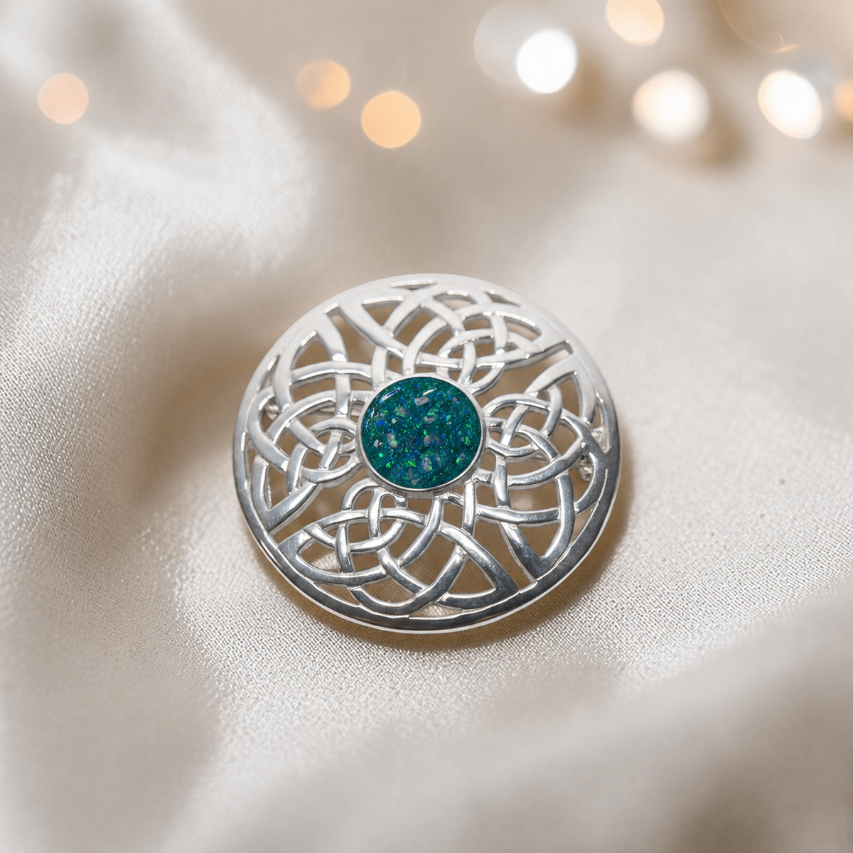Skye brooch - sterling silver Celtic ashes memorial brooch in teal mist, handcrafted in Lancashire UK - by Keepsake Memorial Jewellery