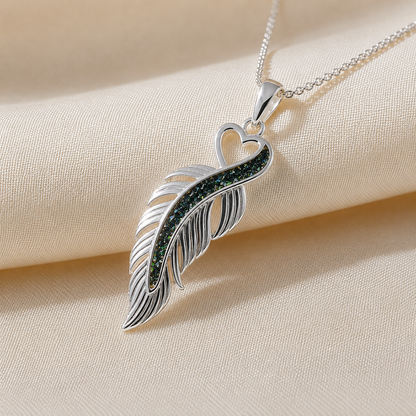 Spica feather memorial pendant in black flame, handcrafted in Lancashire UK