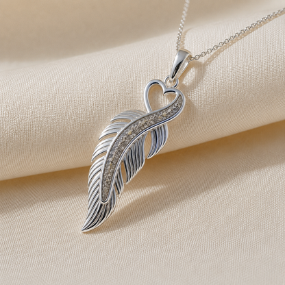 Spica feather memorial pendant in natural ash, handcrafted in Lancashire UK 
