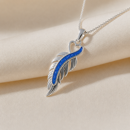 Spica feather memorial pendant in royal blue, handcrafted in Lancashire UK