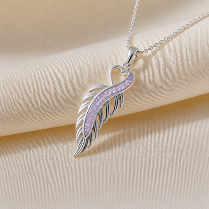 Spica feather memorial pendant in unicorn purple, handcrafted in Lancashire UK