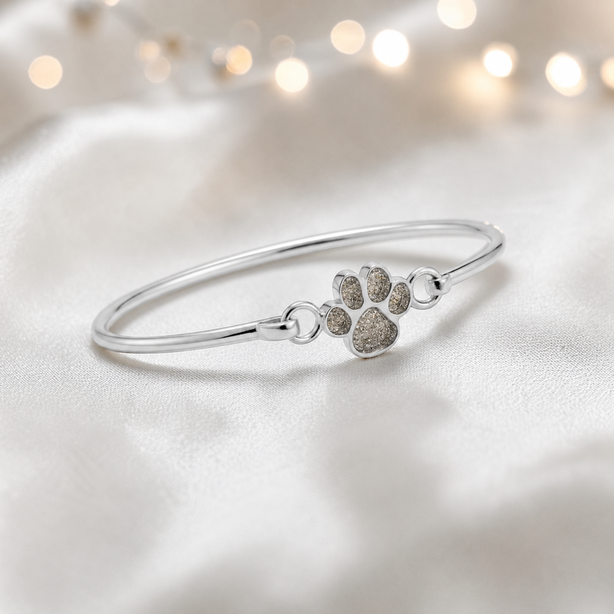 Starlight paw ashes bangle, in natural ash, handcrafted in Lancashire UK - by Keepsake Memorial Jewellery