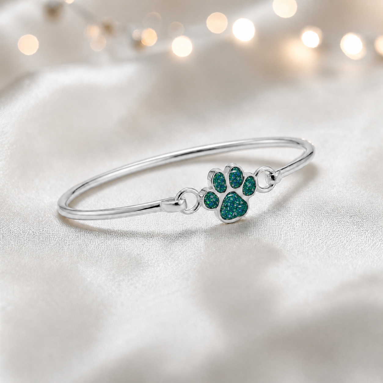Starlight paw ashes bangle, in teal mist, handcrafted in Lancashire UK - by Keepsake Memorial Jewellery