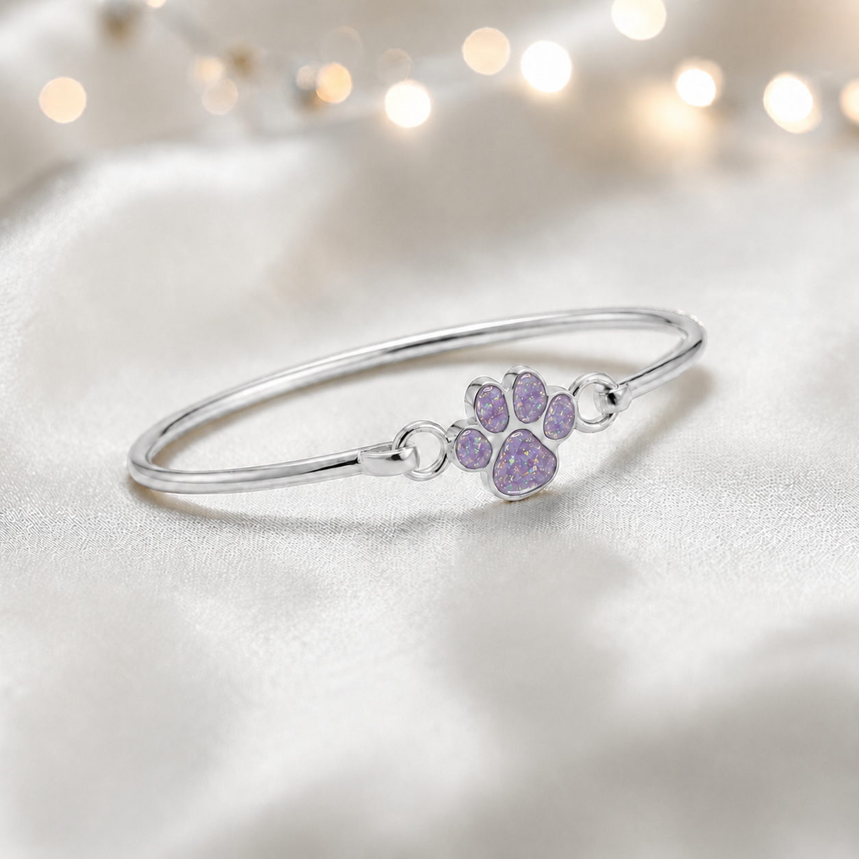 Starlight paw ashes bangle, in unicorn purple, handcrafted in Lancashire UK - by Keepsake Memorial Jewellery
