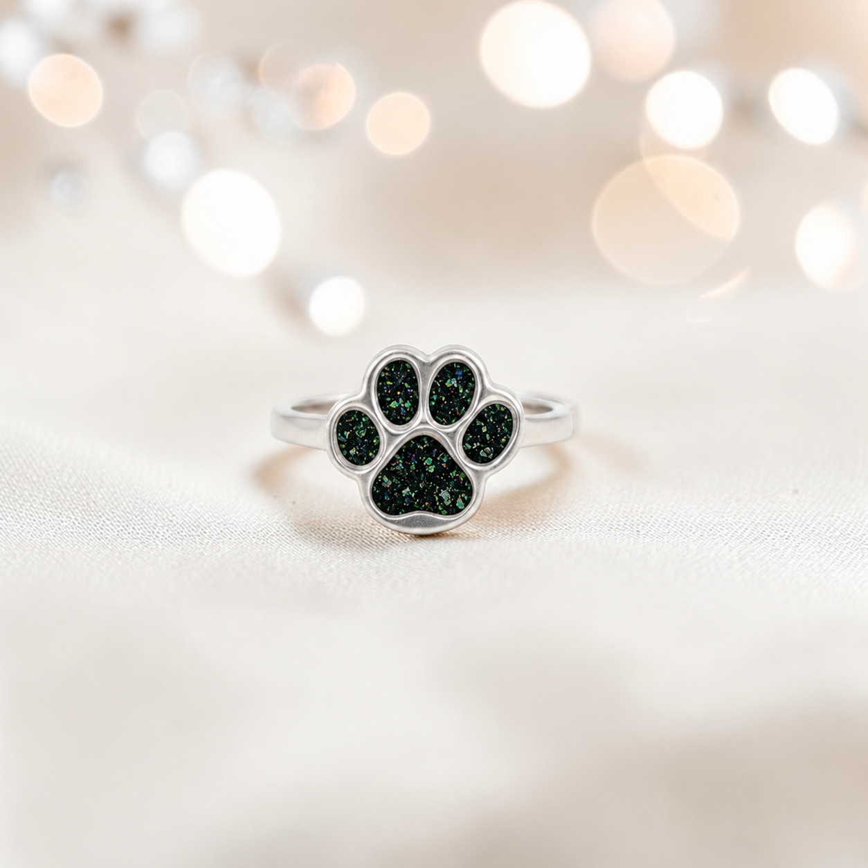 Starlight paw ashes ring in black flame, handcrafted in Lancashire UK - by Keepsake Memorial Jewellery