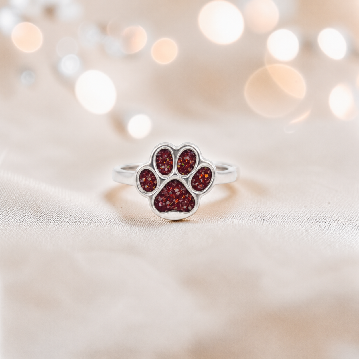 Starlight paw ashes ring in ruby red, handcrafted in Lancashire UK - by Keepsake Memorial Jewellery