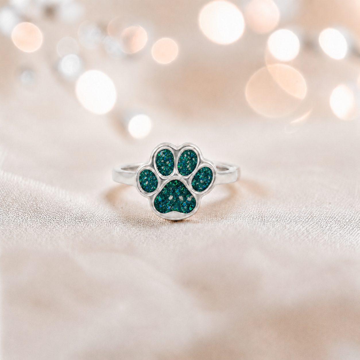 Starlight paw ashes ring in teal mist, handcrafted in Lancashire UK - by Keepsake Memorial Jewellery