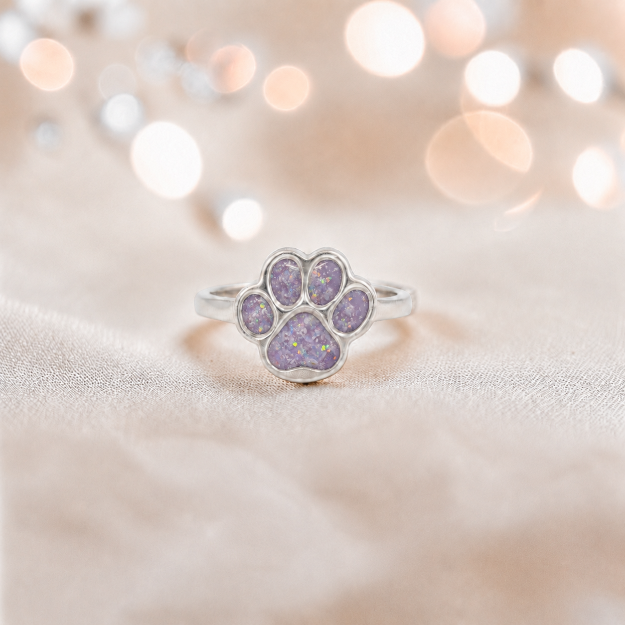 Starlight paw ashes ring in unicorn purple, handcrafted in Lancashire UK - by Keepsake Memorial Jewellery