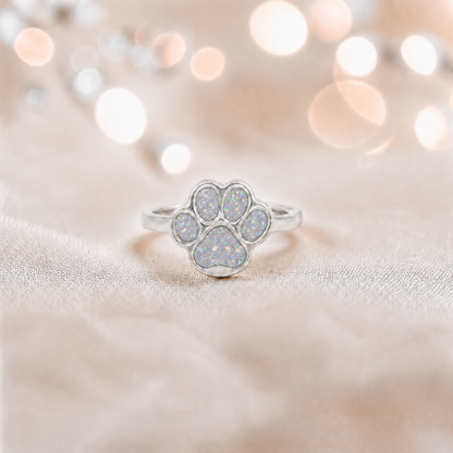 Starlight paw ashes ring in white snow, handcrafted in Lancashire UK - by Keepsake Memorial Jewellery