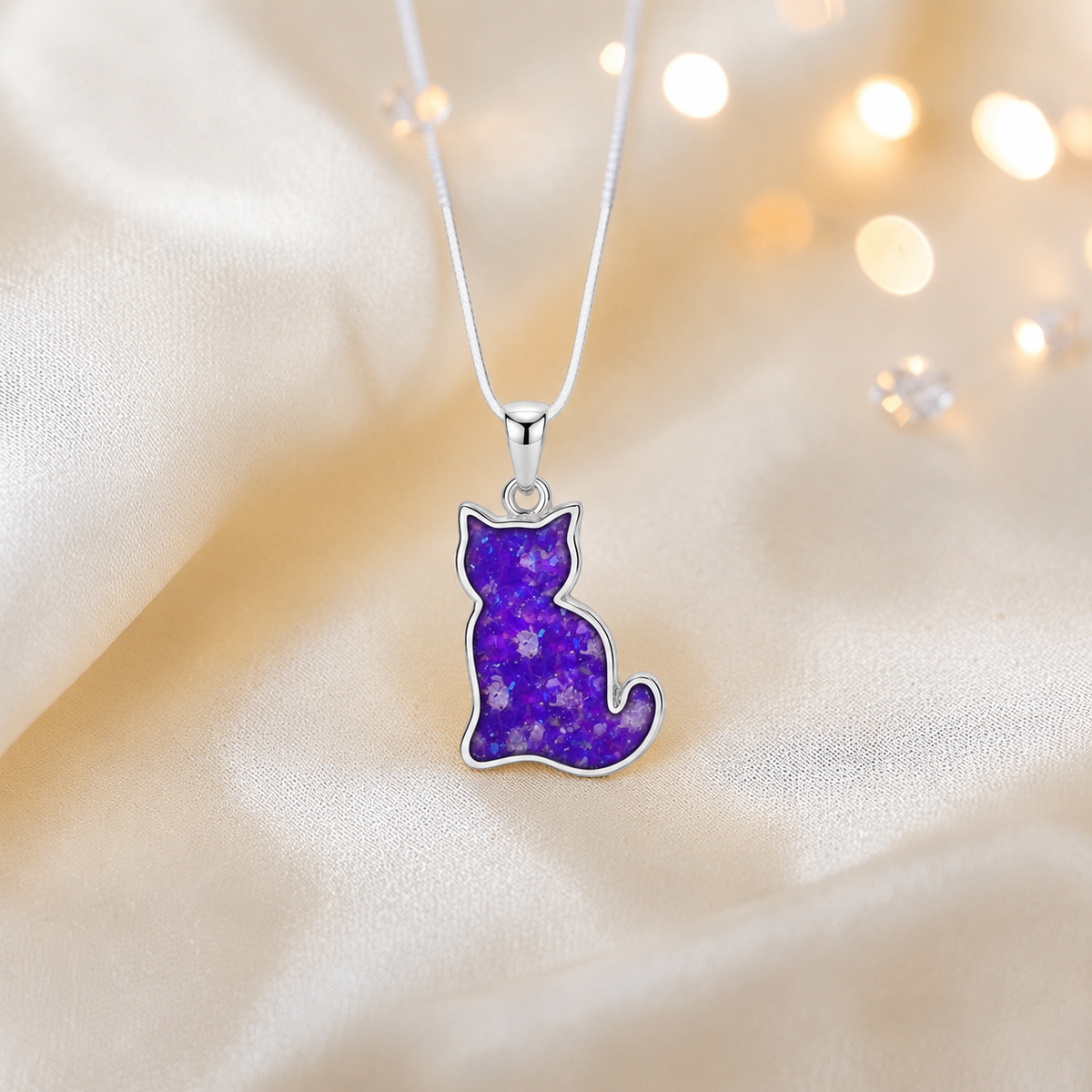 Tabatha Silver cat memorial ashes pendant in sleepy lavender, handcrafted in Lancashire, UK - by Keepsake Memorial Jewellery