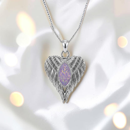 Tayga silver angel wing heart pendant, handcrafted in Lancashire  UK - by Keepsake Memorial Jewellery