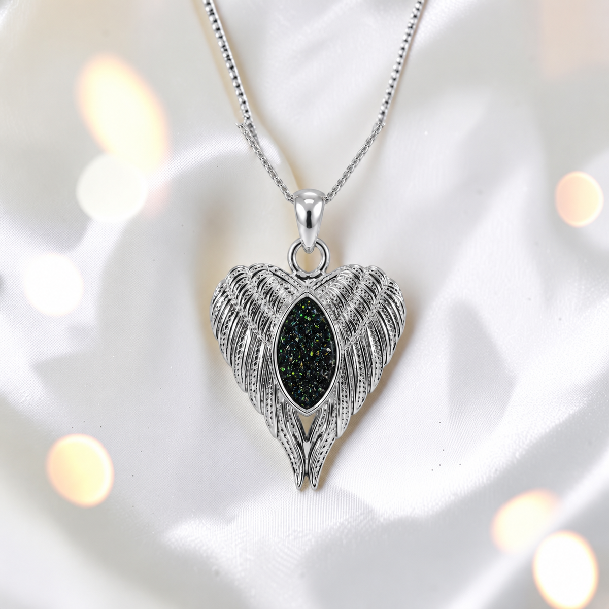 Tayga angel wing heart pendant in black flame, handcrafted in Lancashire UK - by Keepsake Memorial Jewellery