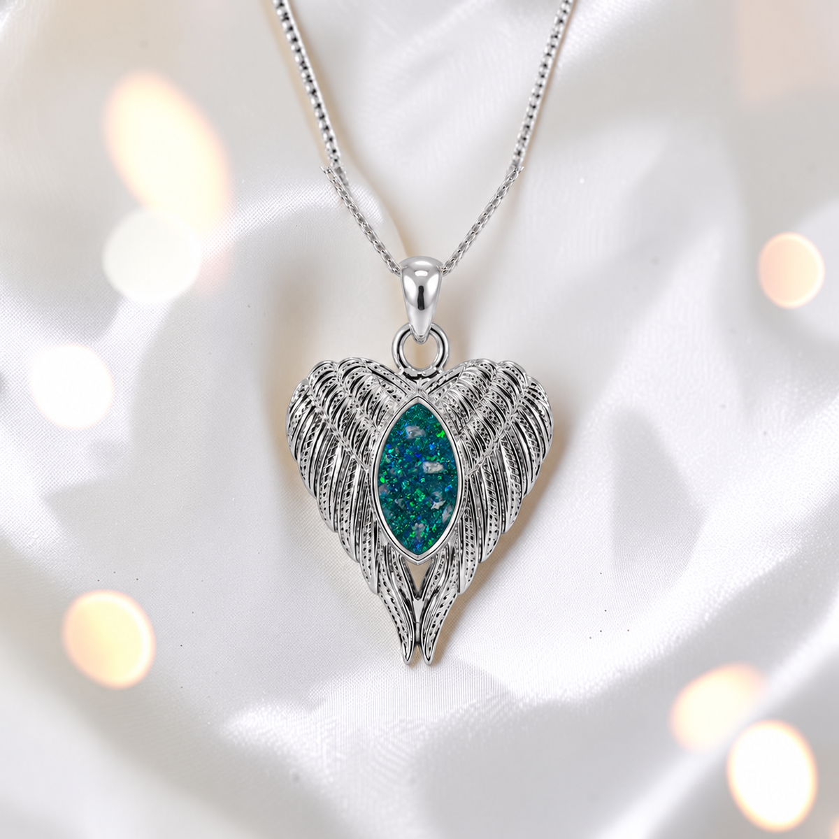 Tayga angel wing heart pendant in teal mist, handcrafted in Lancashire UK - by Keepsake Memorial Jewellery