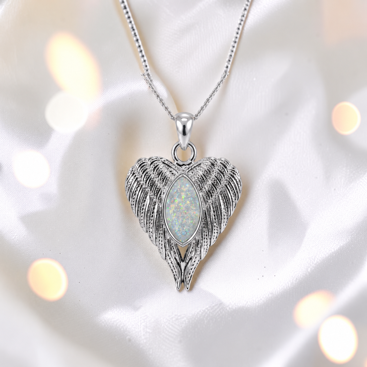 Tayga angel wing heart pendant in white snow, handcrafted in Lancashire UK - by Keepsake Memorial Jewellery