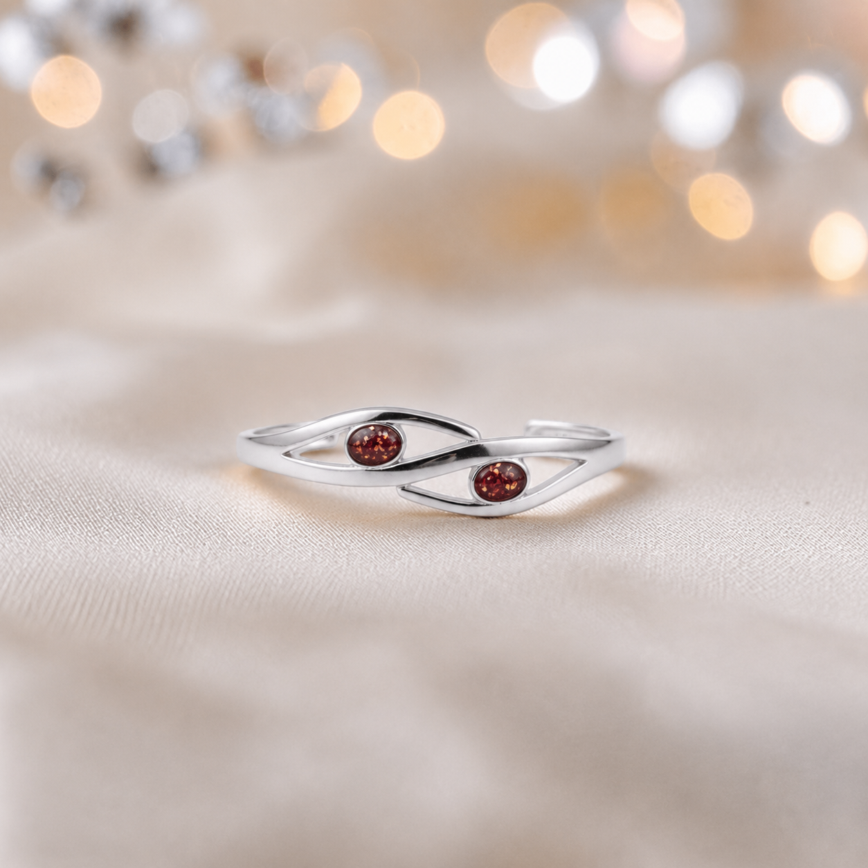 Thalia memorial bangle with two stones, in ruby red, handcrafted in Lancashire UK - by Keepsake Memorial Jewellery