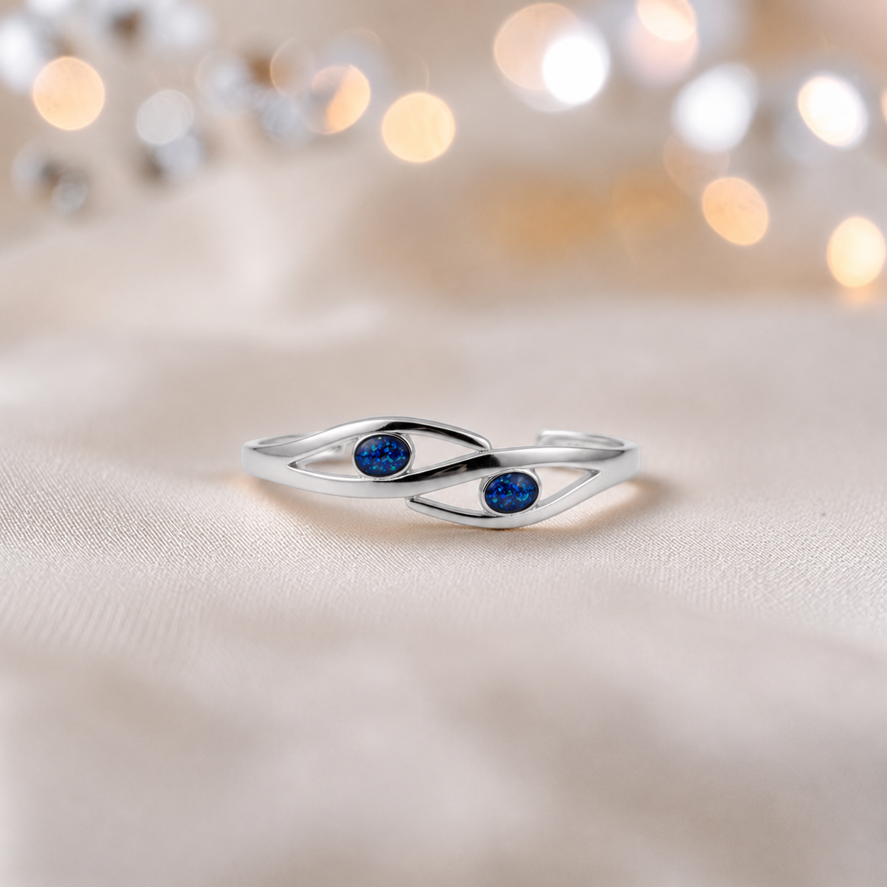 Thalia memorial bangle with two stones, in sapphire glow, handcrafted in Lancashire UK - by Keepsake Memorial Jewellery