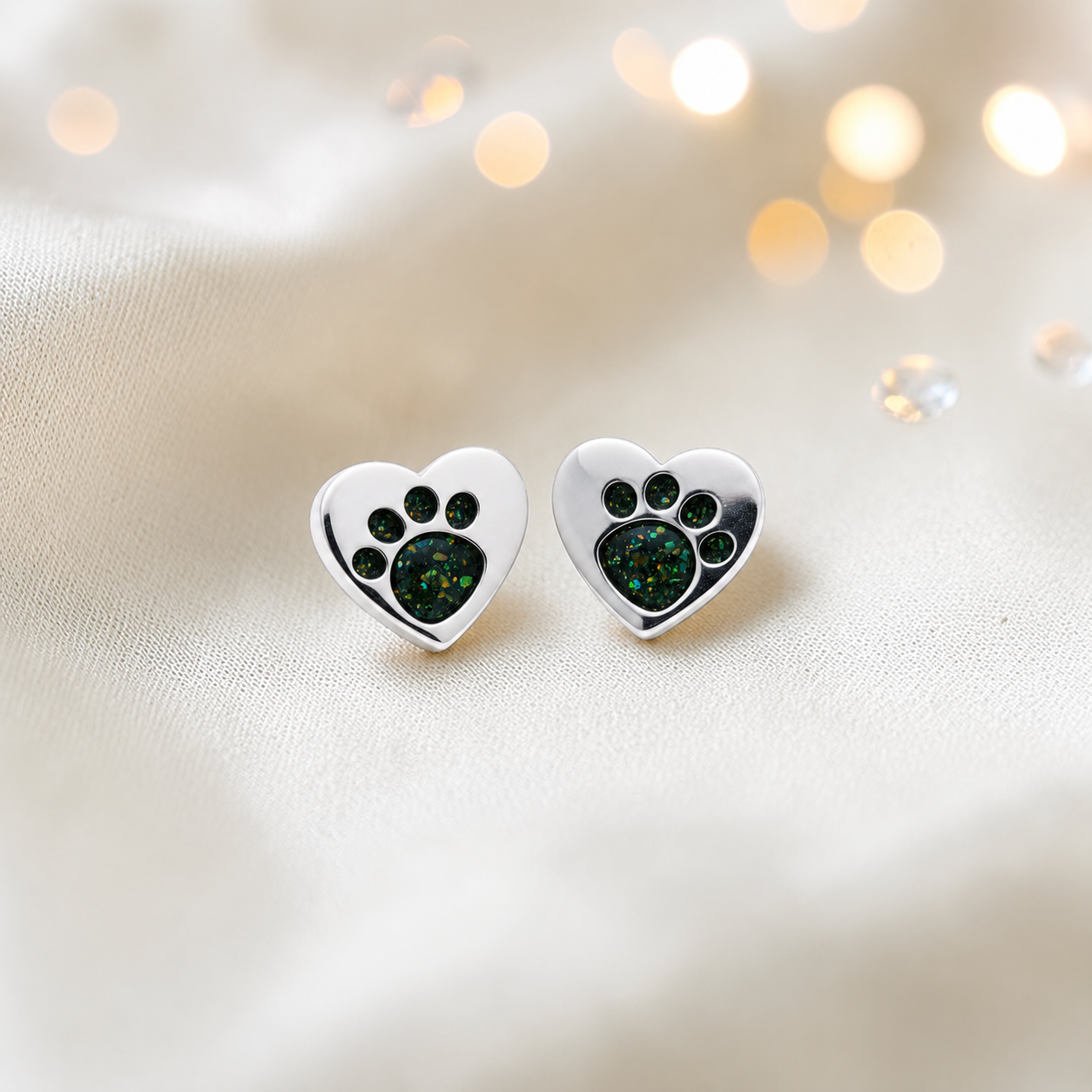 Tilly paw studs — silver heart shaped ashes memorial ear studsin black flame, handcrafted in Lancashire, UK - by Keepsake Memorial Jewellery