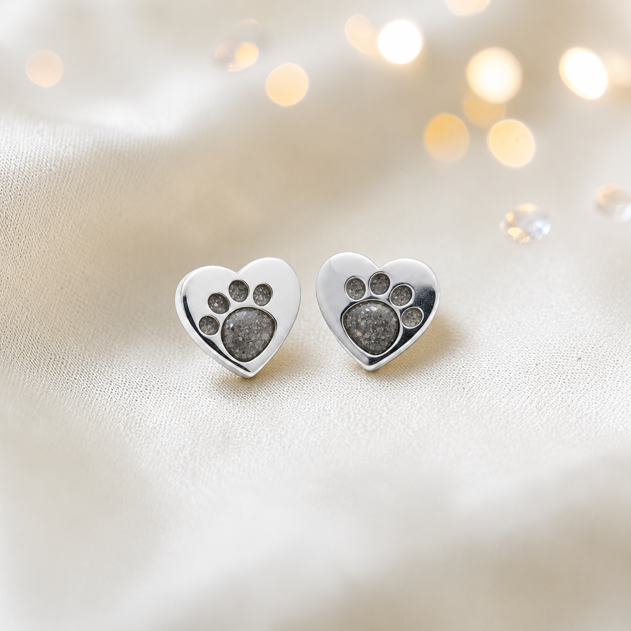 Tilly paw studs — silver heart shaped ashes memorial ear studs in natural ash, handcrafted in Lancashire, UK - by Keepsake Memorial Jewellery