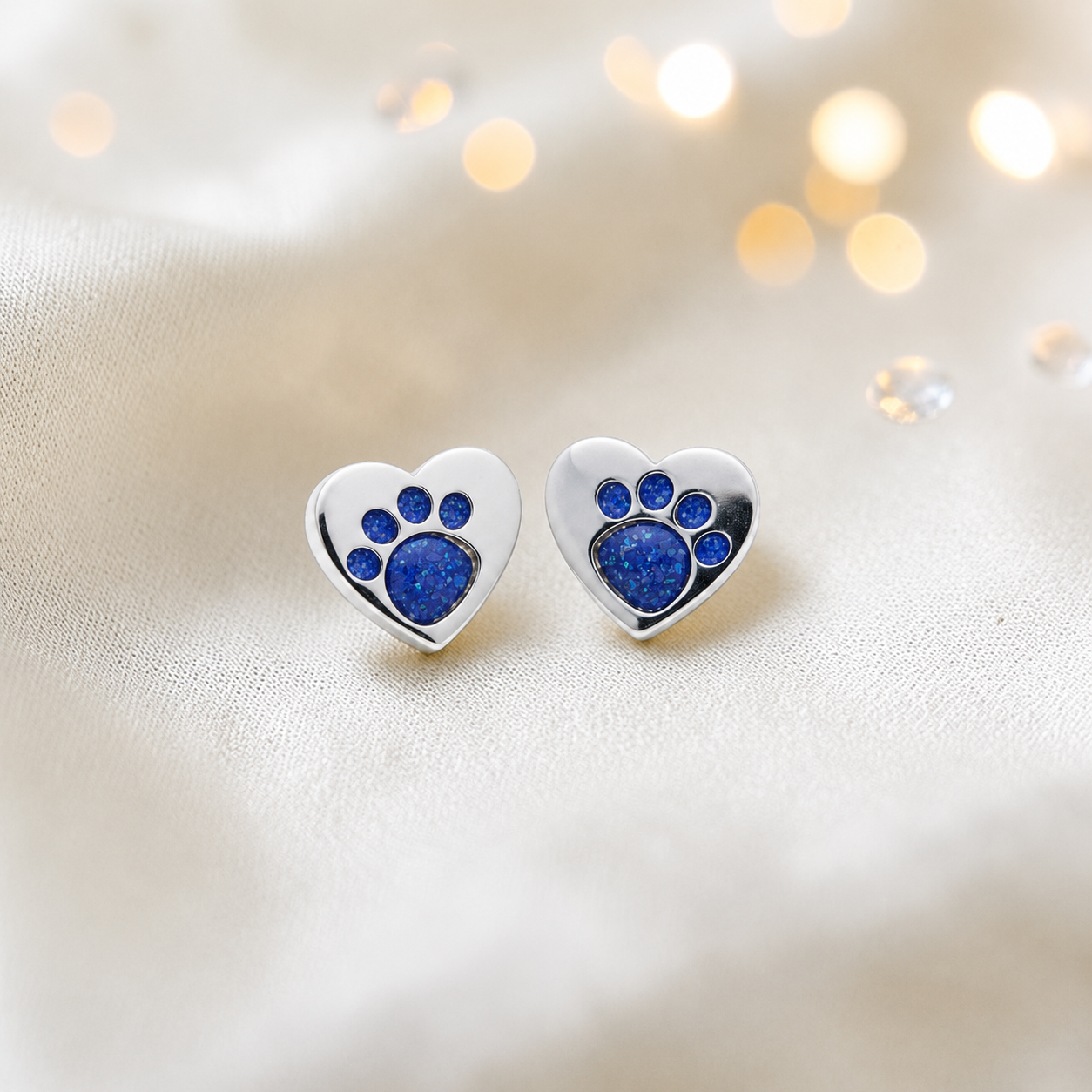 Tilly paw studs — silver heart shaped ashes memorial ear studs in royal blue, handcrafted in Lancashire, UK - by Keepsake Memorial Jewellery