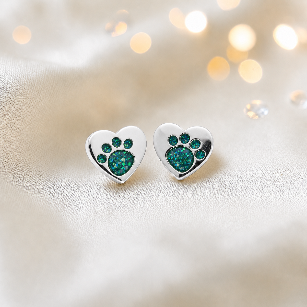 Tilly paw studs — silver heart shaped ashes memorial ear studs in teal mist, handcrafted in Lancashire, UK - by Keepsake Memorial Jewellery