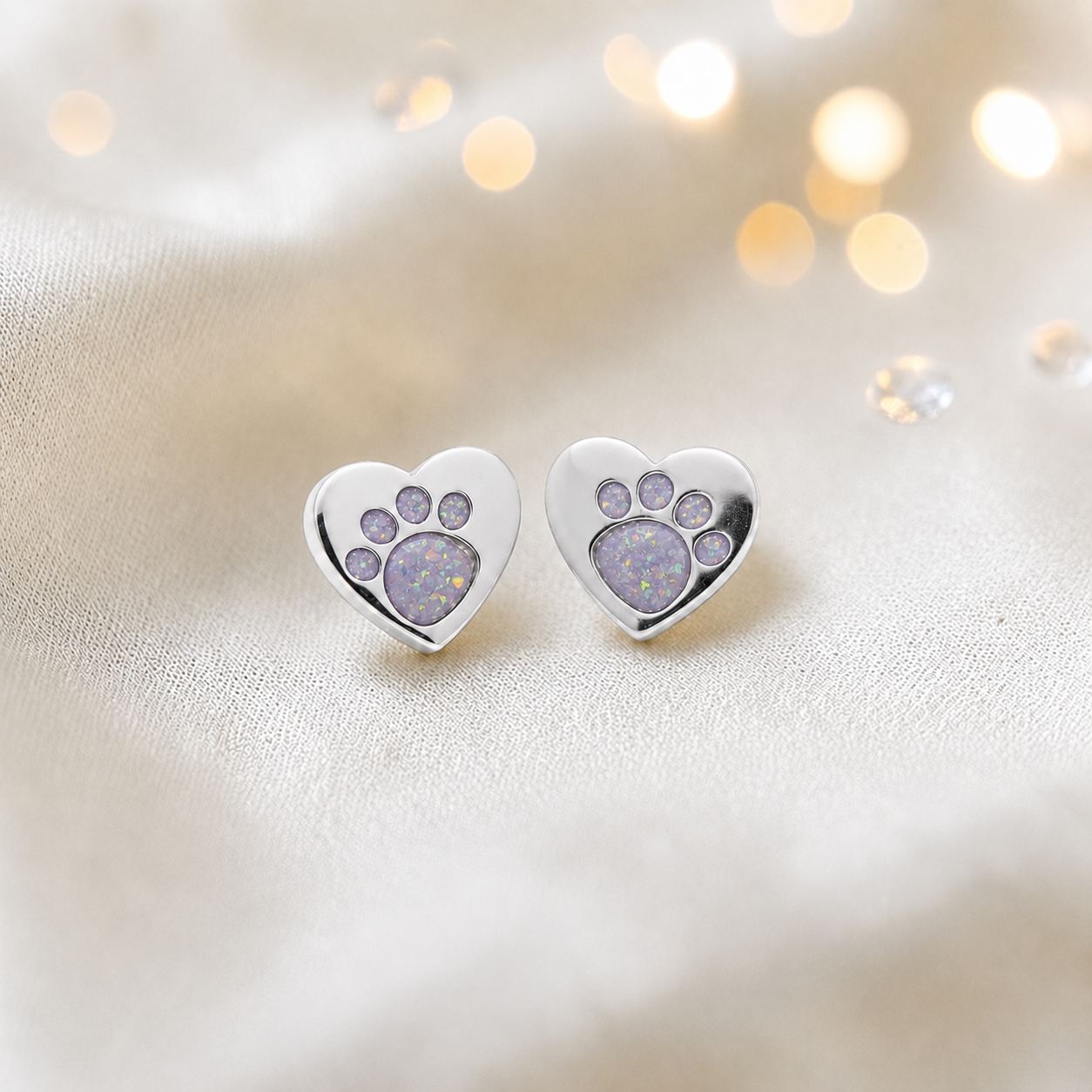 Tilly paw studs — silver heart shaped ashes memorial ear studs in unicorn purple, handcrafted in Lancashire, UK - by Keepsake Memorial Jewellery