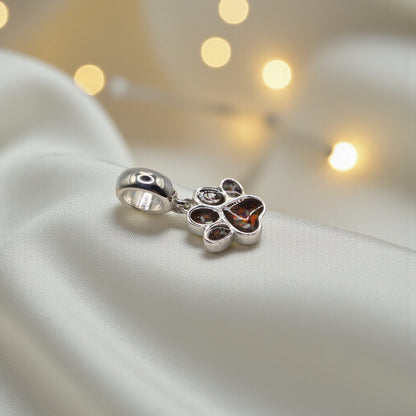 Whiskers dangle paw ashes charm,  close up view, handcrafted in Lancashire UK - by Keepsake Memorial Jewellery 