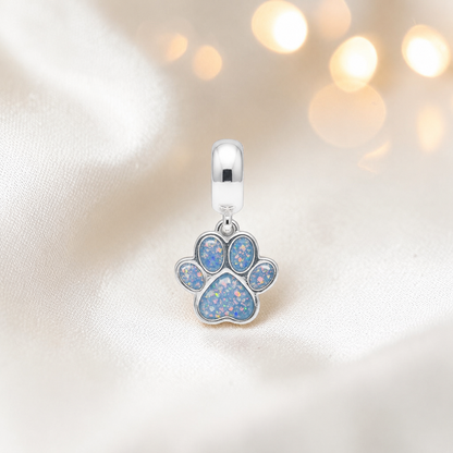 Whiskers dangle paw ashes charm, in baby blue, handcrafted in Lancashire UK - by Keepsake Memorial Jewellery 