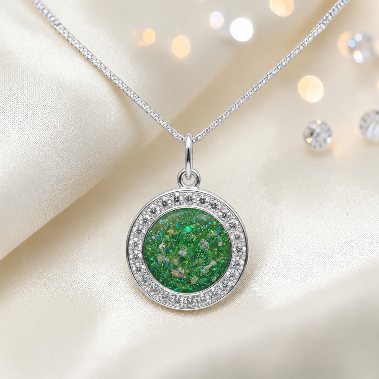 Zosma round memorial locket with CZ stones in fruit green, handcrafted in Lancashire UK  by Keepsake Memorial Jewellery