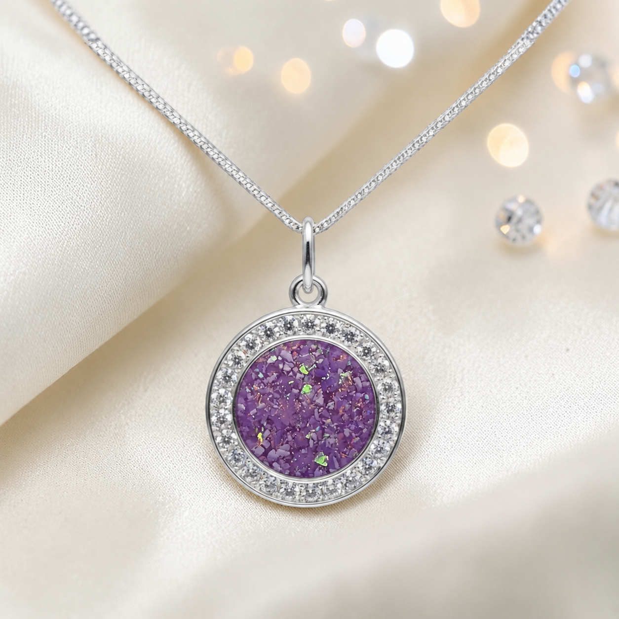Zosma round memorial locket with CZ stones in rose pink, handcrafted in Lancashire UK  by Keepsake Memorial Jewellery