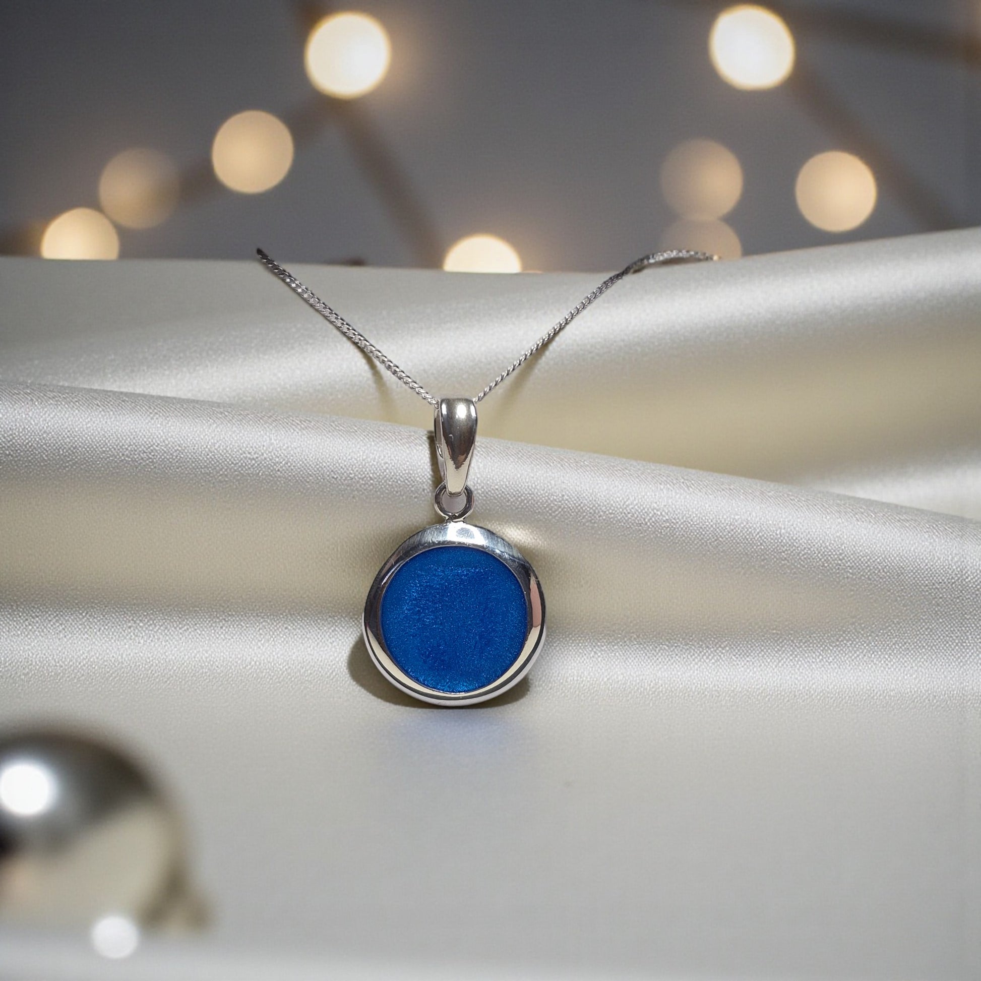 round memorial ashes pendant, handcrafted in uk