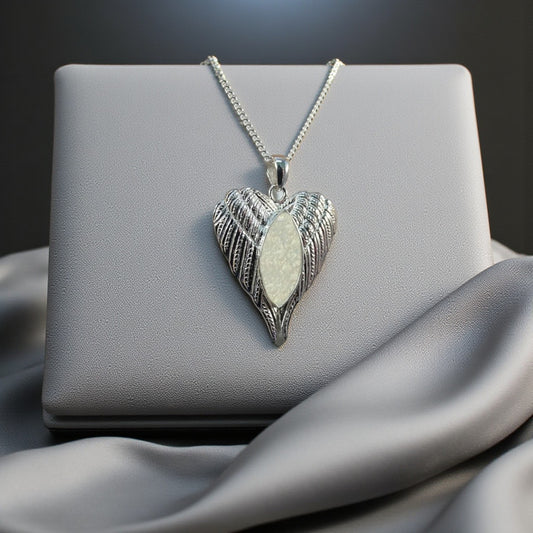 Silver angel wing memorial keepsake pendant, handcrafted in Lancashire UK