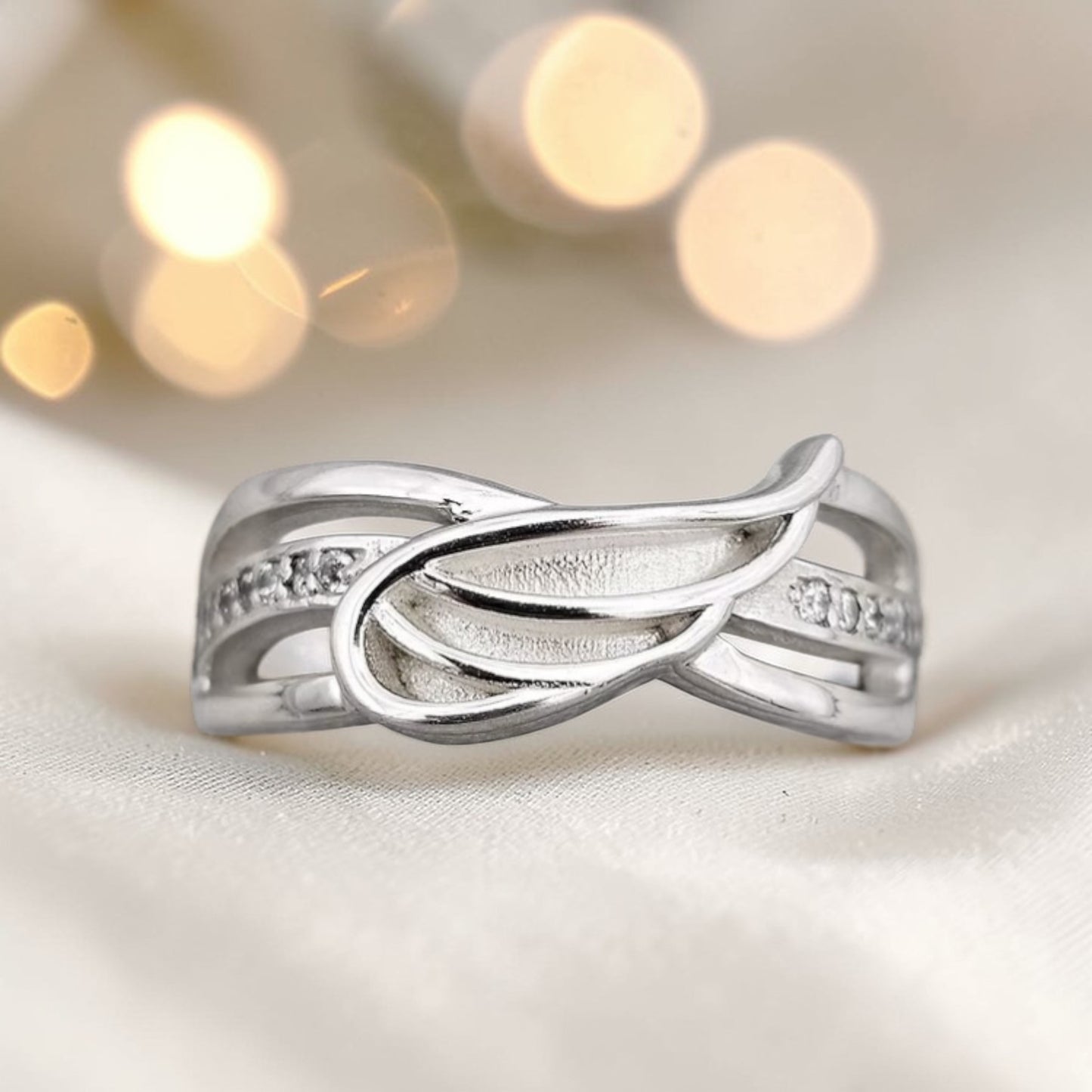 Angelica Ring — silver angel wing ashes memorial ring, handcrafted in the UK