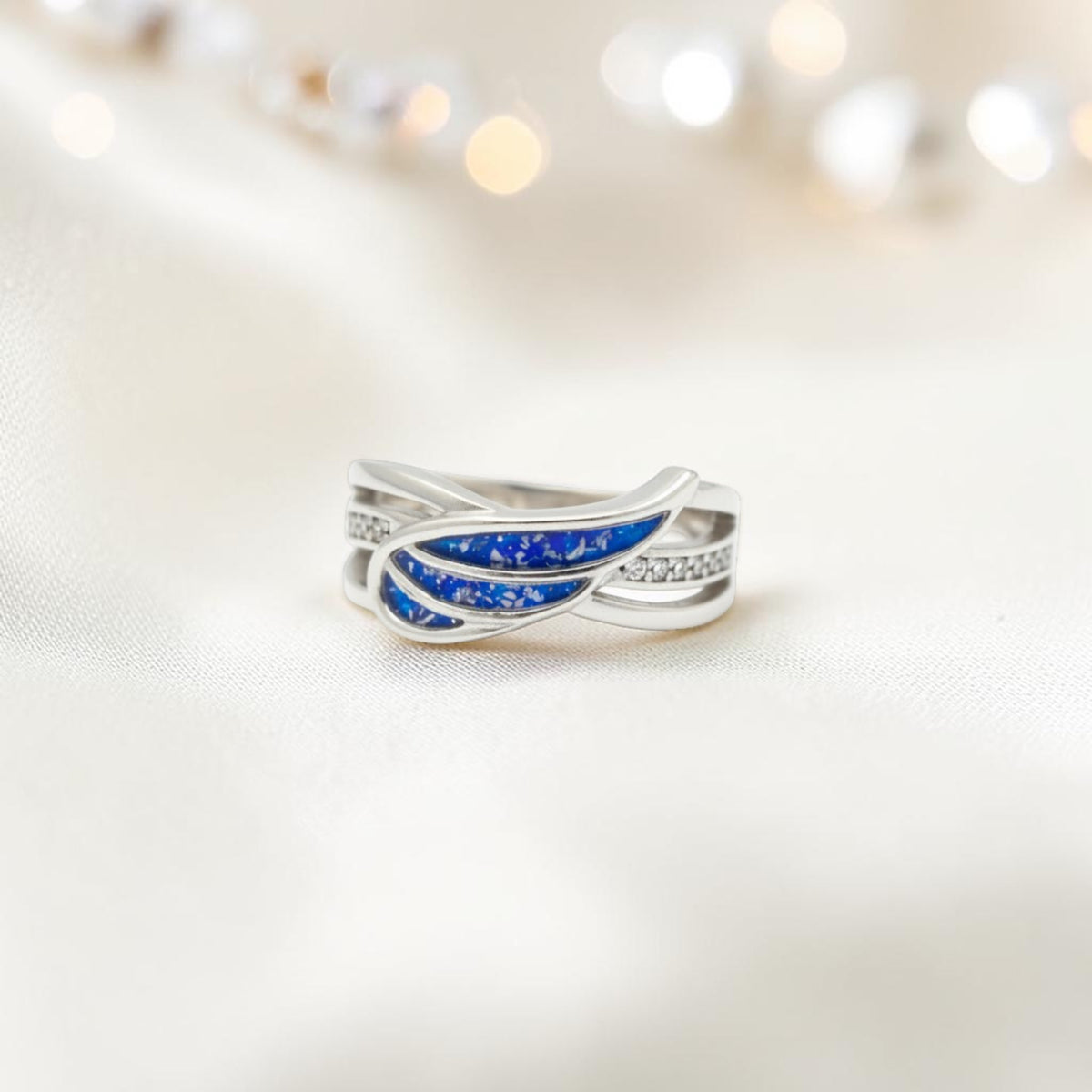 Angelica Ring — silver angel wing keepsake memorial ring, handcrafted in Lancashire, UK