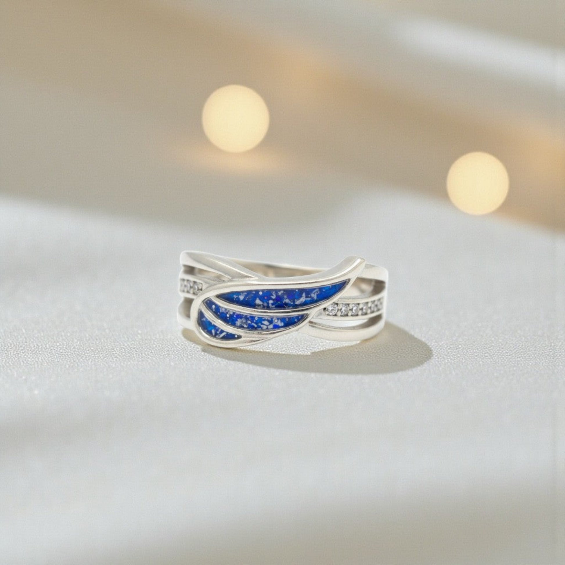 Angelica Ring — silver angel wing keepsake memorial ring, handcrafted in Lancashire, UK