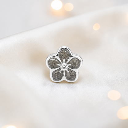 Natural ash sterling silver forget me not ashes memorial charm, handcrafted in Lancashire by keepsake memorial