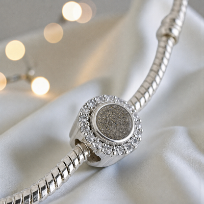 Natural ash sterling silver halo ashes memorial charm, handcrafted in Lancashire by keepsake memorial