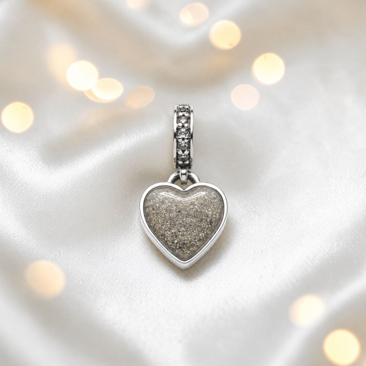 Natural ash sterling silver heavens heart ashes memorial dangle  charm, handcrafted in Lancashire by keepsake memorial