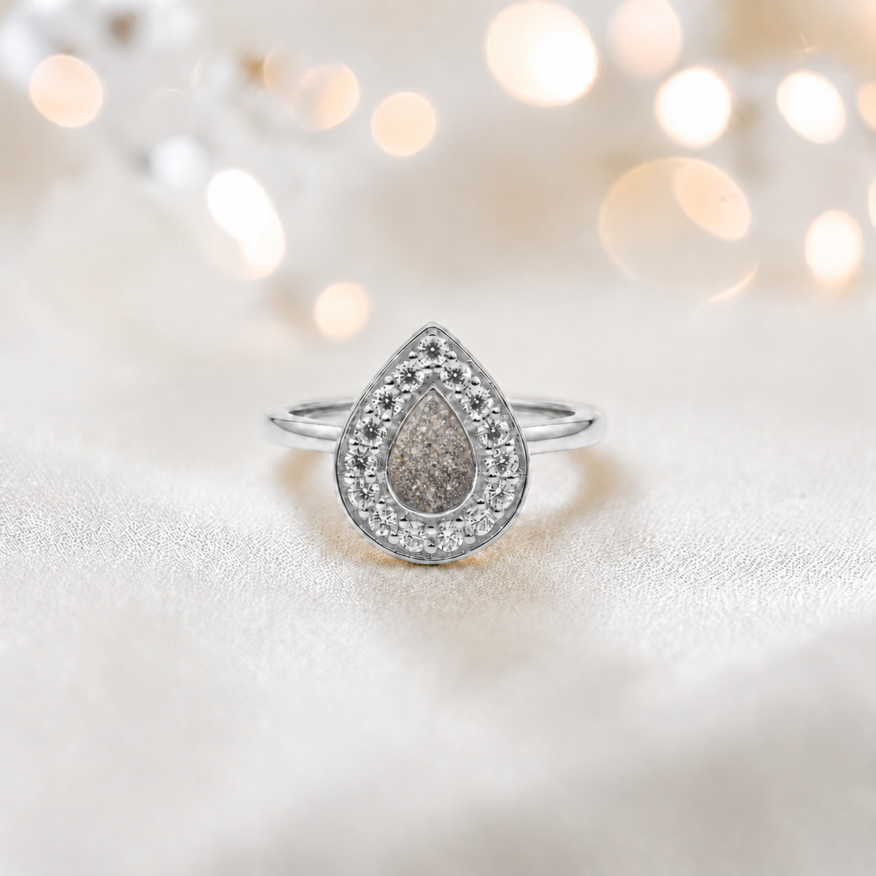 Keepsake Memorial Silver Helena Teardrop Ashes Ring in Natural Ash — handcrafted in Lancashire, UK