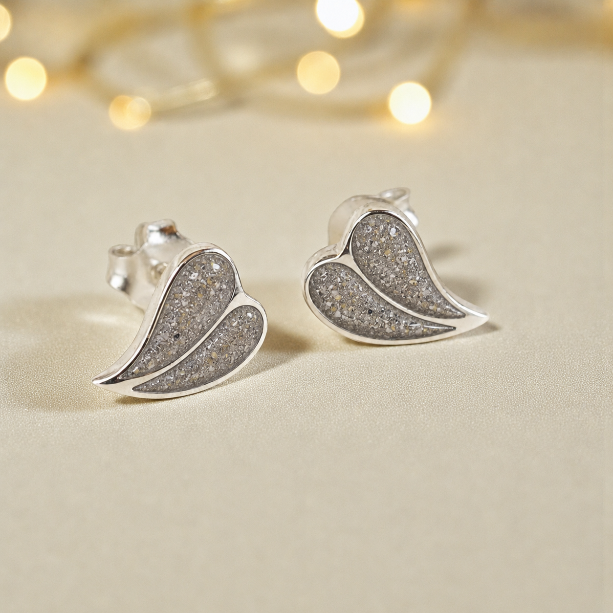 Two Hearts memorial stud earrings in Natural Ash opal — sterling silver, handcrafted in Lancashire, UK