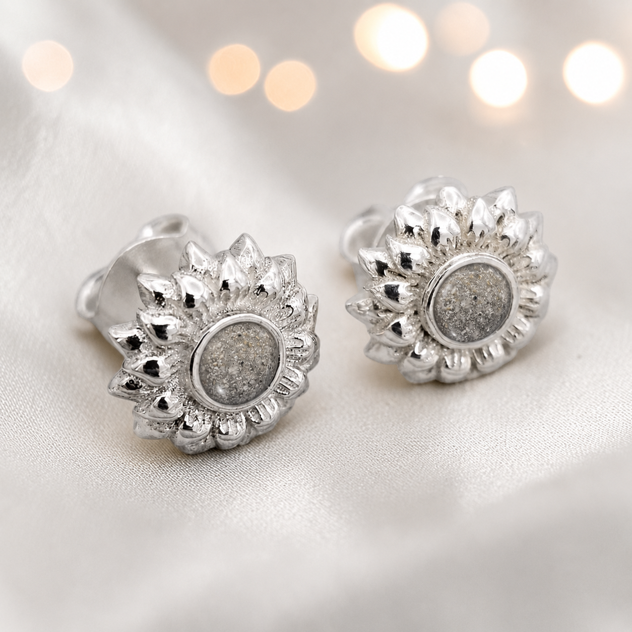Flora Earrings — silver sunflower ashes memorial stud earrings in Natural Ash resin, handcrafted in Lancashire, UK