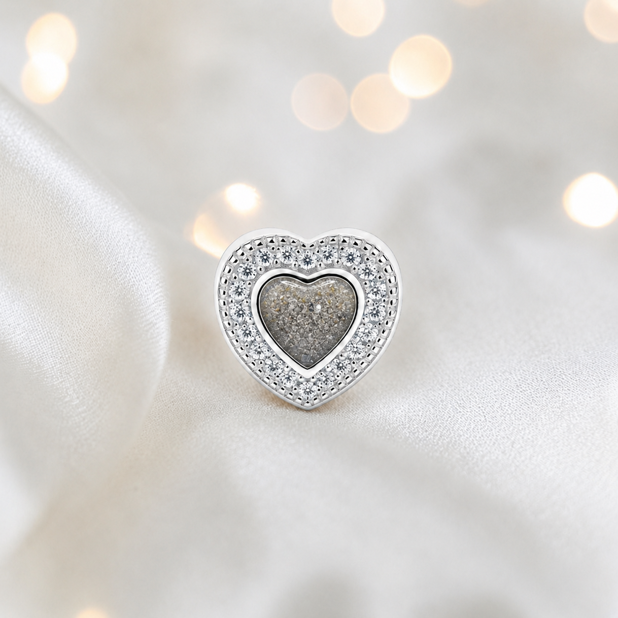 Natural ash sterling silver whispers of love  ashes memorial charm, handcrafted in Lancashire by keepsake memorial
