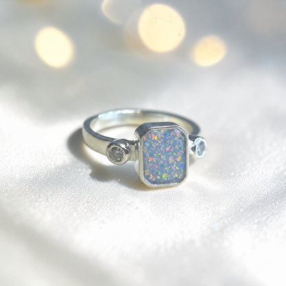 Keepsake Memorial Silver Anastasia Emerald Cut Ashes Ring in Baby Blue — handcrafted in Lancashire, UK