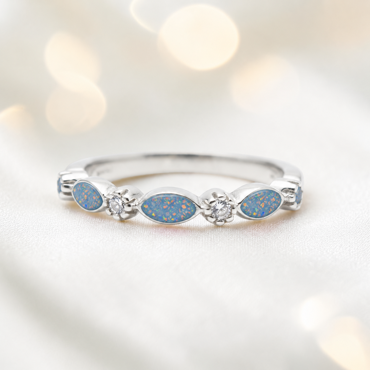 Keepsake Memorial Silver Arabella Half-Band Marquise Ashes Ring in Baby Blue  — handcrafted in Lancashire, UK