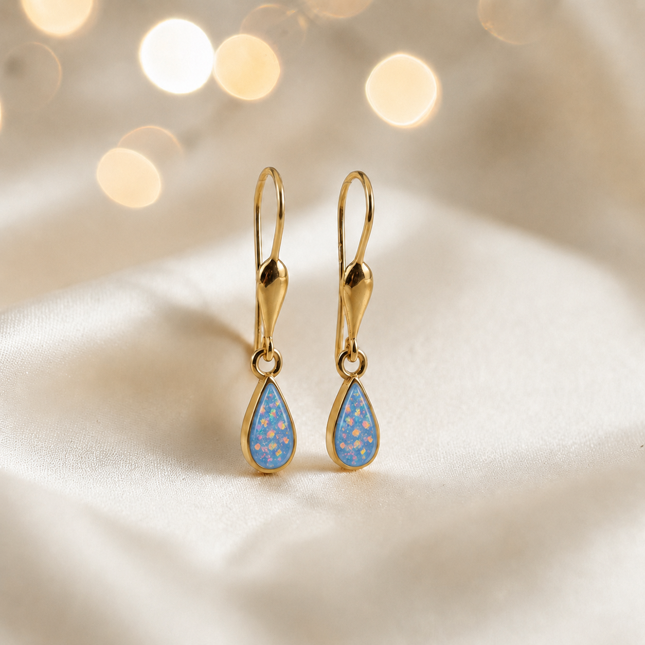 Baby Blue Calla 9ct gold drop memorial earrings, handcrafted in Lancashire, UK – by Keepsake Memorial Jewellery