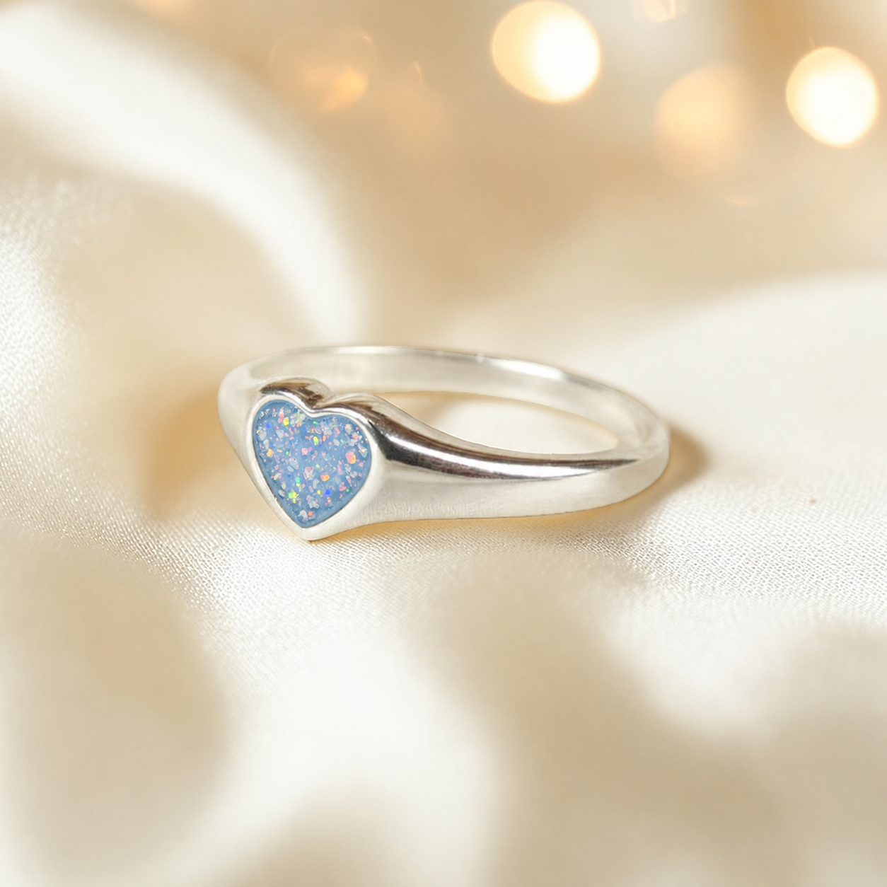 Eden Heart shaped memorial ashes ring with baby blue,  handcrafted in Lancashire, UK.